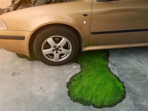 yellow liquid leaking from car|8 Reasons Your Car May Be Leaking Fluid